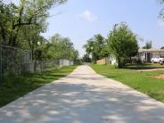 Trail running through neighborhood