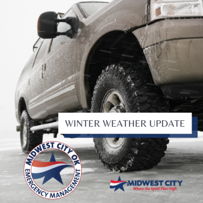 SUV on an ice covered road with Midwest City and Emergency Management Logos